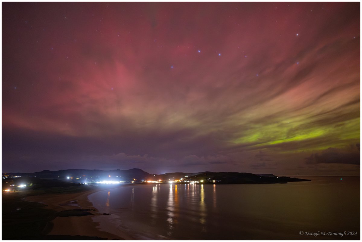 It's amazing what you can see along the #WildAtlanticWay 🤩#Aurora dancing over Ballymastocker Bay & Lough Swilly from the Knockalla WAW Discovery point Co. Donegal🇮🇪