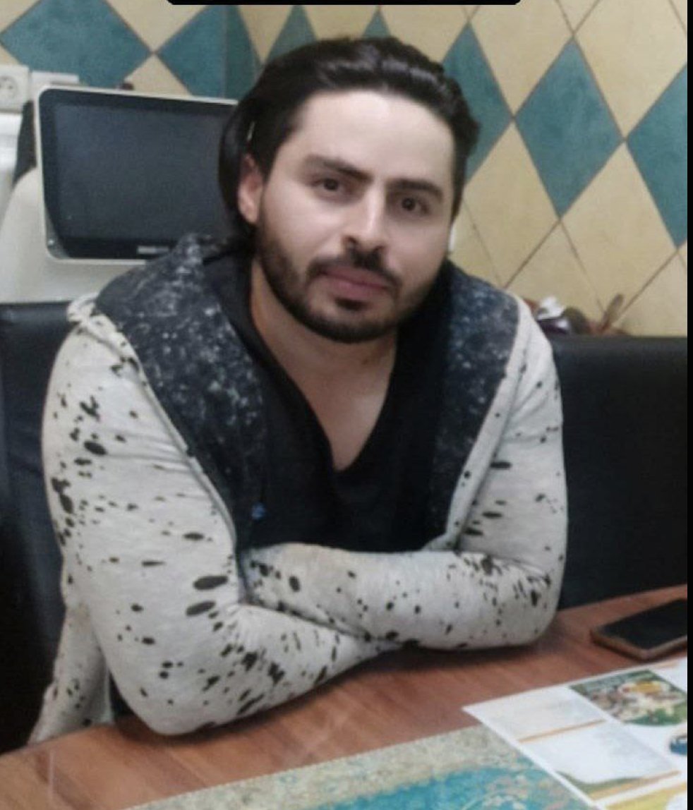Hengaw_English's tweet photo. A year ago today,

#JinaAmini, a Kurdish girl from Saqqez, fell into a coma and ultimately lost her life due to the brutal assault inflicted by government forces after her arrest by “Morality Police” of Islamic republic of Iran. Her death became a manifest for the nationwide “Jin, Joan, Azadi” movement.

Present Day,

Hamed Baqeri, a young Kurdish man from Islamabad Gharb, residing in Karaj, was tragically killed by direct gunfire from government suppressive forces on the streets of Karaj for inviting people to commemorate the anniversary of Jina.