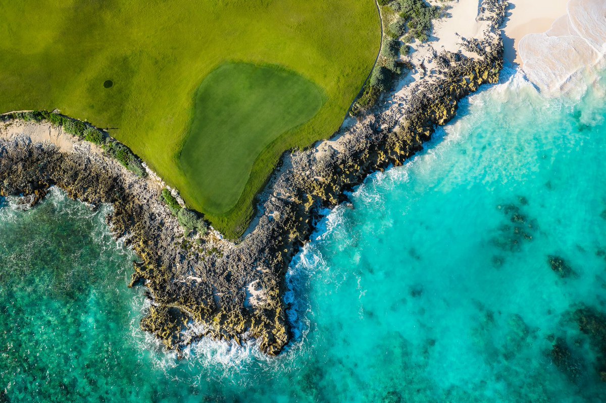 The Playground @jacksbayclub is a 10-hole short course that traces the shoreline of the blue Bahamian waters, the 7th green shown here.