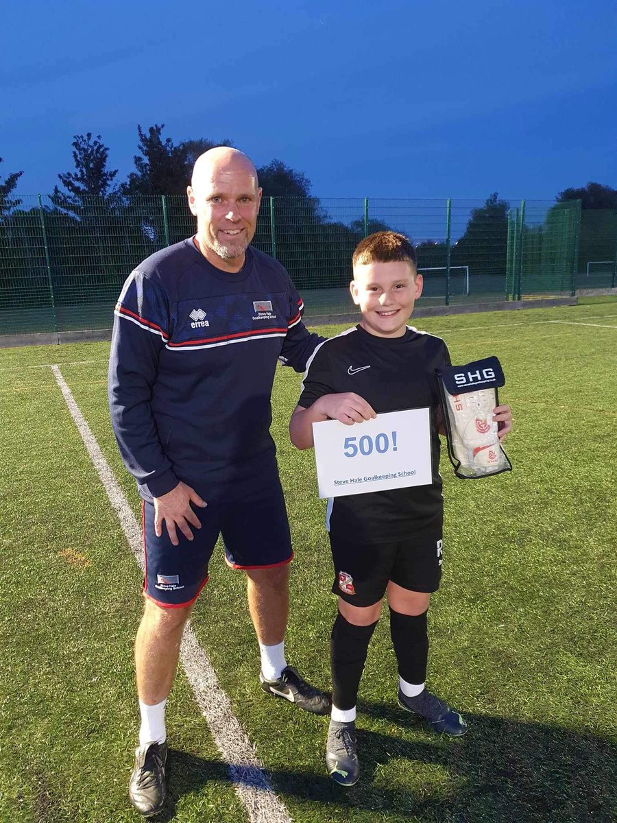 SteveHaleGK's tweet photo. After just starting our 17th year of Steve Hale Goalkeeping School we have now hit another milestone with Ryan Griffiths becoming the 500th goalkeeper coached by us!
Ryan was pleased with his free pair of SHG gloves to mark our milestone! #500NotOut https://t.co/Gy6pXYoB5A