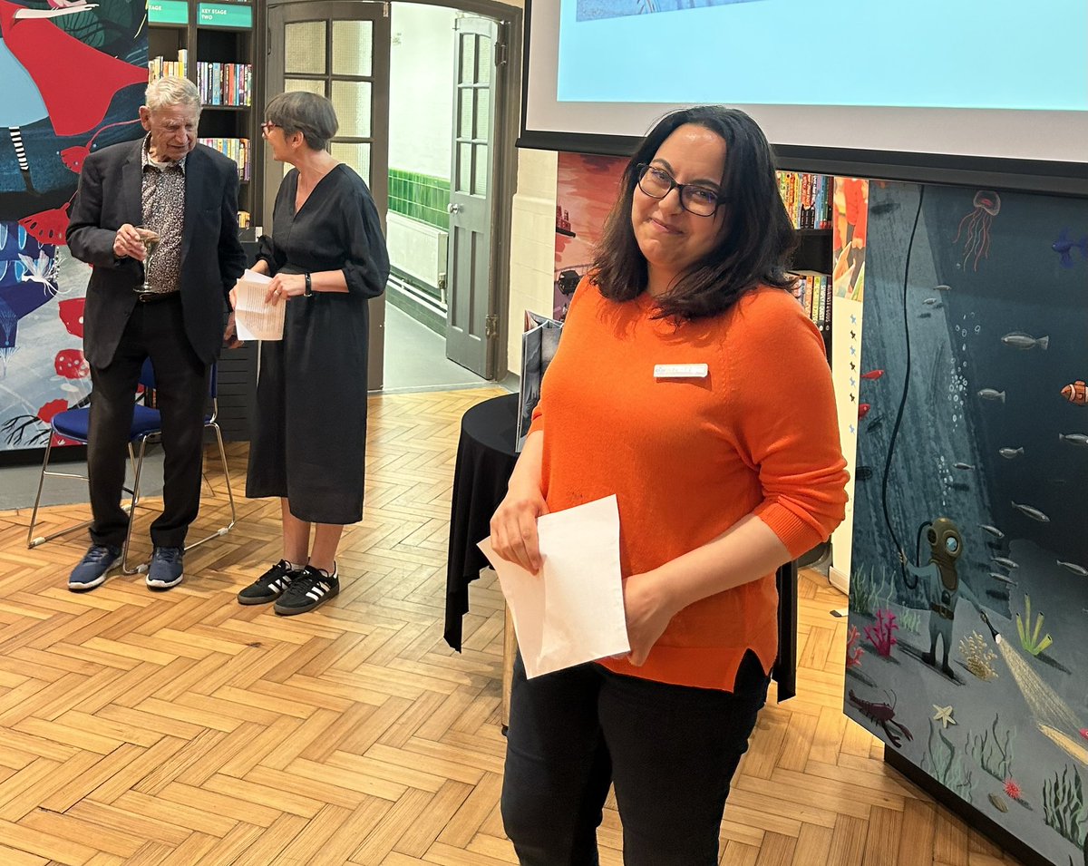 jejr100's tweet photo. What a delight is the @KlausFluggePr at @clpe1's #LiteracyLibrary: welcomed by @storyriver, MCd by @ReeceAndrea with The Eponymous Living National Treasure on hand to distribute prizes where every shortlistee — introduced by @LydiaMonks and @Josephnamara — is a winner. https://t.co/FwvWGGmJxB