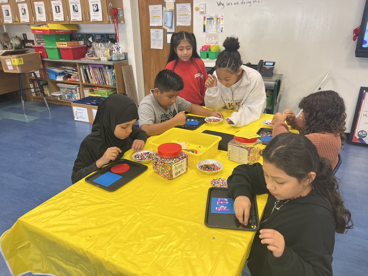 Our scholars are working on their dot projects with Mrs. Rossi because National dot day is coming! We love STEAM at Hillcrest! #NewSeason❤️💙