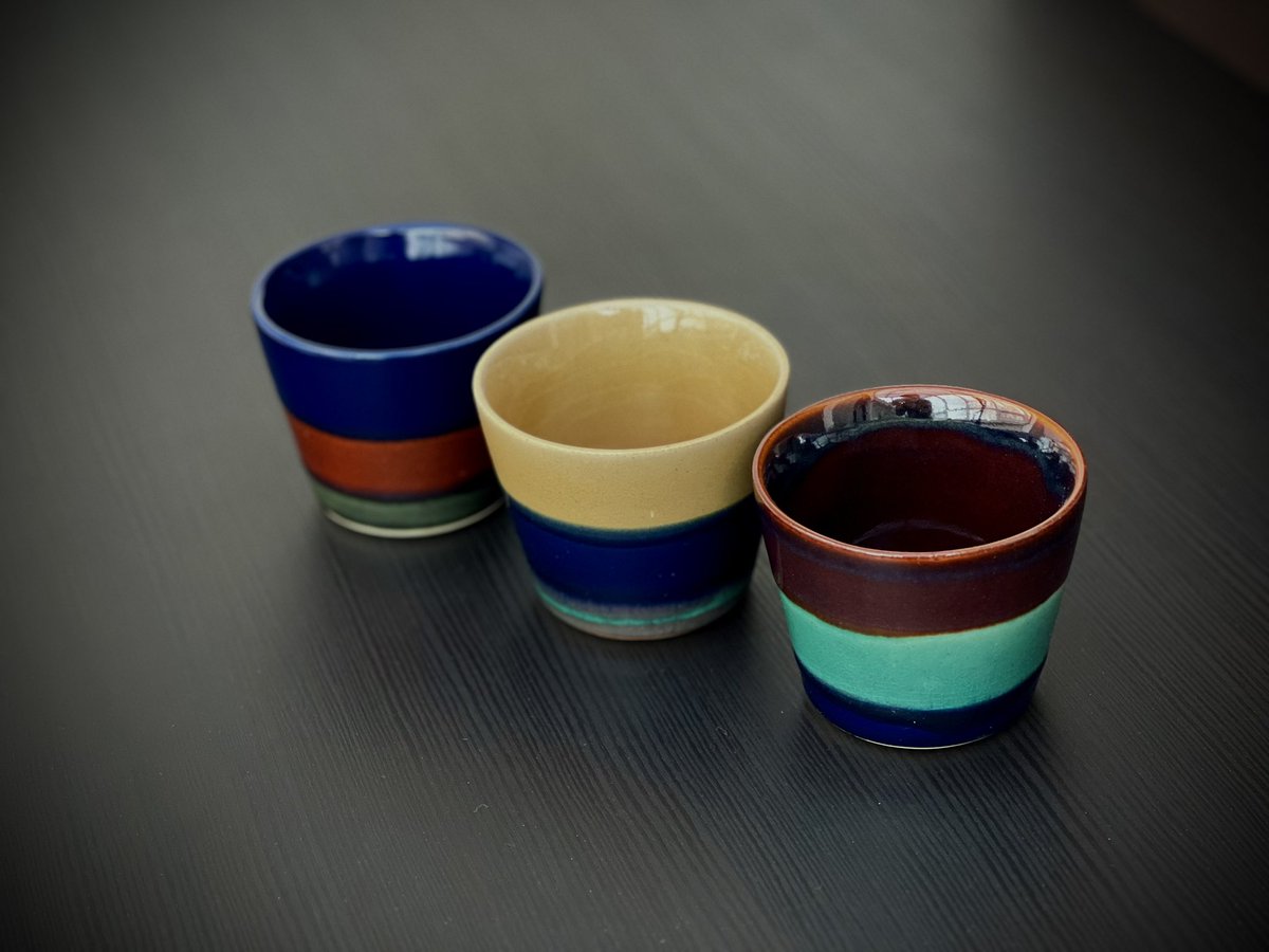 MatsukazeTea's tweet photo. Brilliant, multi-coloured yunomi teacups build off base colours of maroon, blue and yellow - collect the rainbow! 🌈 Size and thick ceramics make these teacups especially good for hotter teas like genmaicha and houjicha. #yyctea #onlineshop #matsukazetea https://t.co/ImRp85EkYV