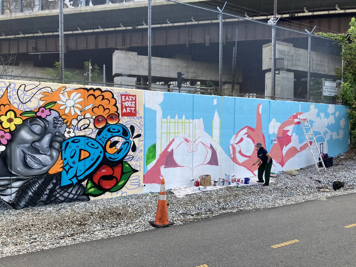 wmata's tweet image. Hurry! Only a few days left to see the NoMa in Color Mural 🎨 at Alethia Tanner Park along the Metropolitan Branch Trail. Catch the artists in action until September 15th. #artintransit #NOMABID #wmata