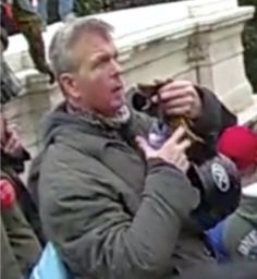 retiredtrnman's tweet photo. The #FBI has ID'd many who incited violence at the U.S. Capitol on January 6, but it still needs your help to bring others to justice. If the person in this photo looks familiar, submit a tip at https://t.co/LRUnRA40bG or 1-800-CALL-FBI, and mention photo #516-AFO. #DemVoice1 https://t.co/KiHV8LLvEO