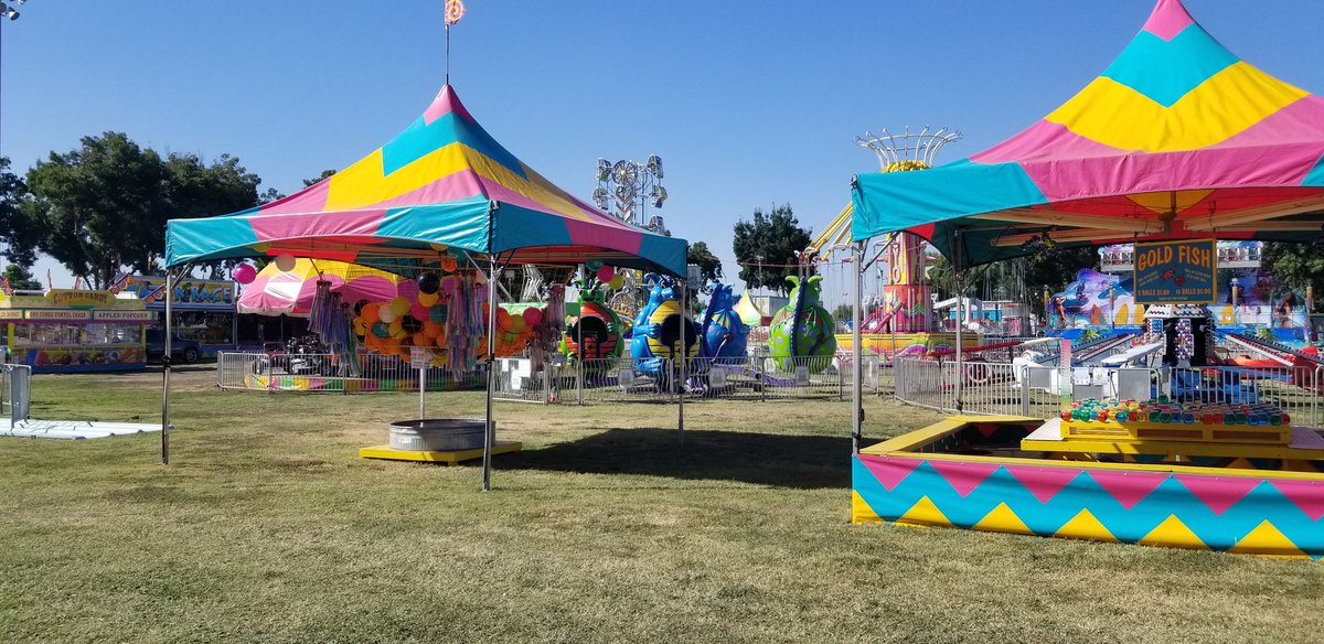 kn4kman's tweet photo. The midway for the #Kerman Harvest Festival, sponsored by the Kerman Chamber of Commerce in Kerckhoff Park is taking shape. Opening ceremony is tomorrow, Sept. 14th, at 7pm. Hope to see you all there this weekend!
#HarvestFestival #KermanChamber #KermanCalifornia https://t.co/5oSoRHAVur