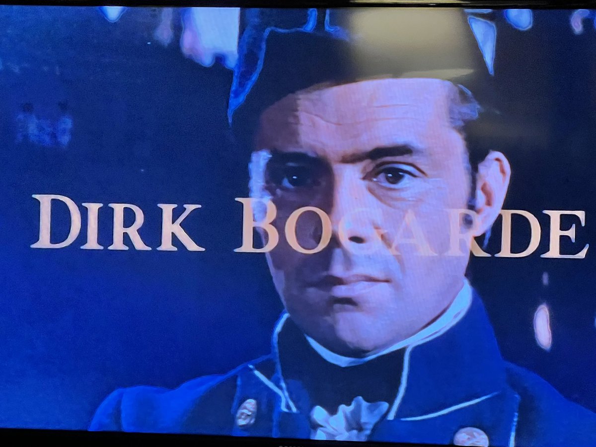 Condimentgrrl's tweet photo. Dirk Bogarde wears that uniform well. I love it when the #SOTM is FINE AF. #TCMParty #DamnTheDefiant https://t.co/Zw5PkxKadW