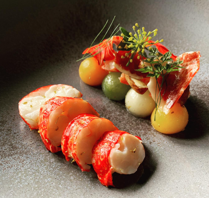 A stunning native lobster, charentais melon, Iberico ham and ajo blanco dish made by John Brewster, one of our judges for YCOY23!

Just look at that presentation 😍