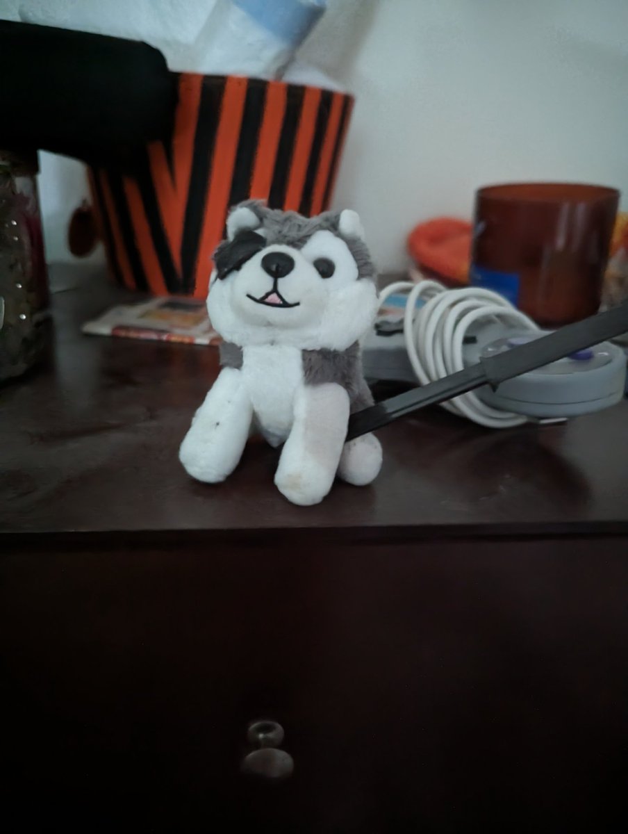 esotericbanana's tweet photo. @othatsraspberry I have a little D dog that watches over me while I sleep. (That's a plastic knife in his legs to protect me) https://t.co/P4fd8ZEo9V