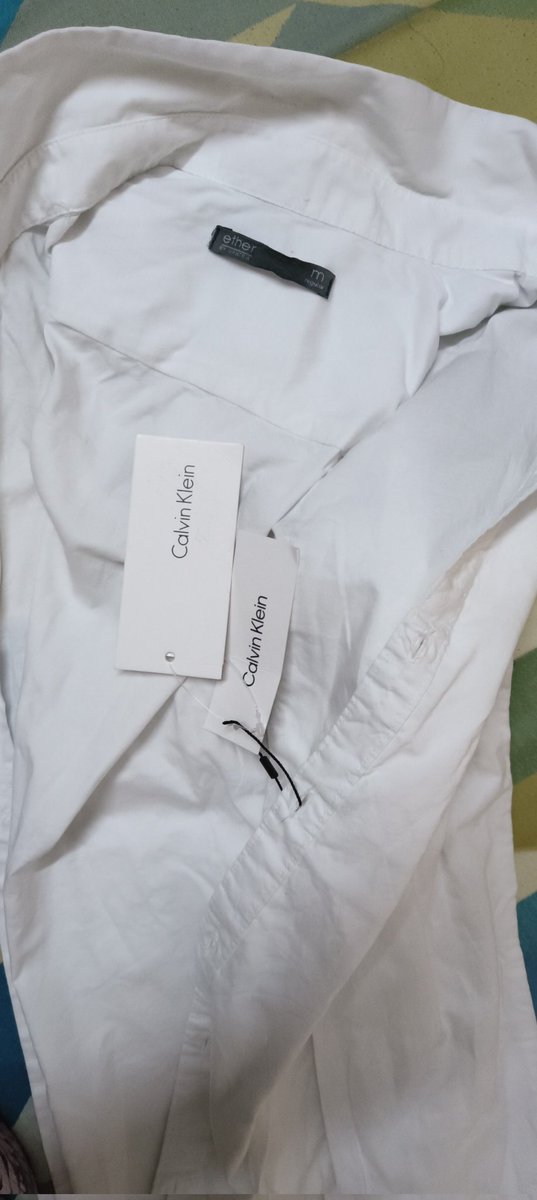 pankhu23's tweet photo. I ordered a @CalvinKlein white shirt for Rs. 4400 on @amazon @amazonIN with order ID 408-4030452-8647529 on August 20th. However, I received a completely different item, an Ether by @myntra white shirt on August 22nd. I initiated a return on the same day and also contacted the https://t.co/4rlKeyOhfM