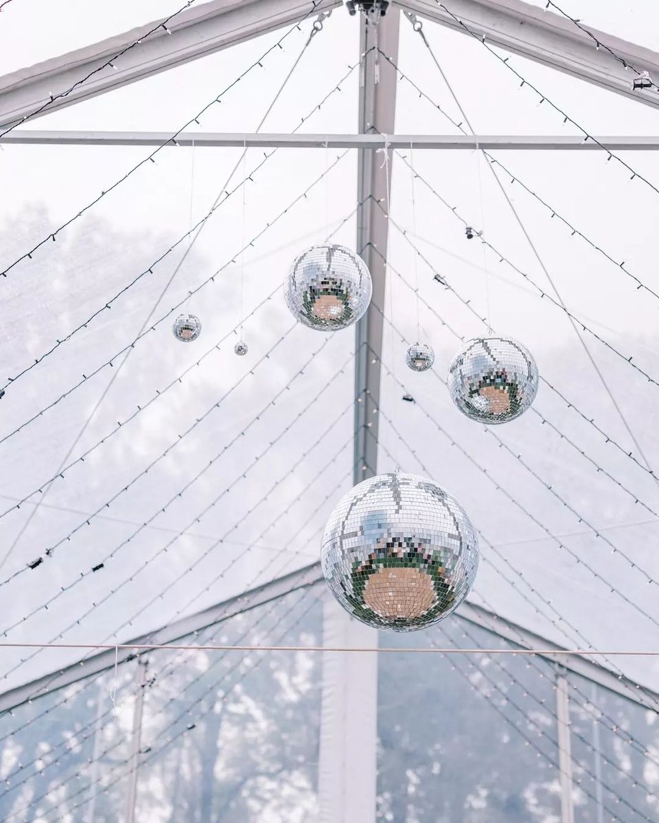 Calling all brides-to-be! Get your sparkle on with these dreamy disco balls and string lights - perfect for making your wedding day extra special 🤩  #WeddingGoals 💍

Photographer: lauragaresphoto
Magazine: RentMyWedding
Event Planner/ Floral Designer: planlush 
Lighting: omni
