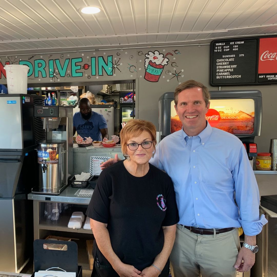 GovAndyBeshear's tweet photo. I loved visiting Mayfield's Mid-Town Drive-In this week! Make sure to stop by for great food and great service – and a good laugh if you spot me behind the counter again. https://t.co/1wTuFojYMP