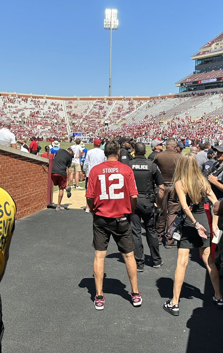 Just another dad wearing his son’s jersey at a football game.