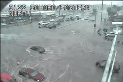 NWSVegas's tweet photo. Very heavy rain is ongoing in the Las Vegas Valley. Stay off the roads if you can - numerous intersections are becoming flooded! #nvwx #VegasWeather https://t.co/MylosXAw0z