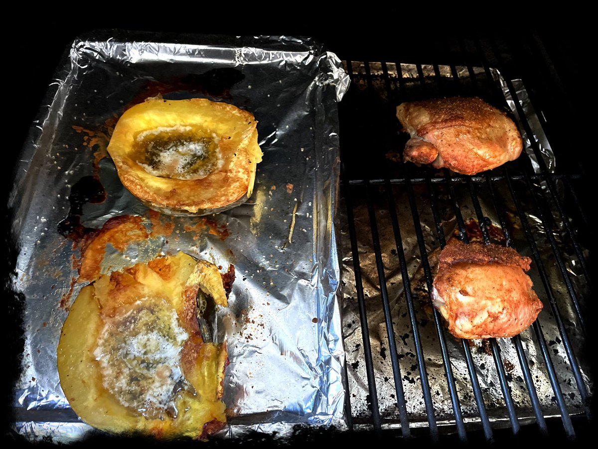 Home grown acorn squash and chicken thighs over oak &amp; hickory