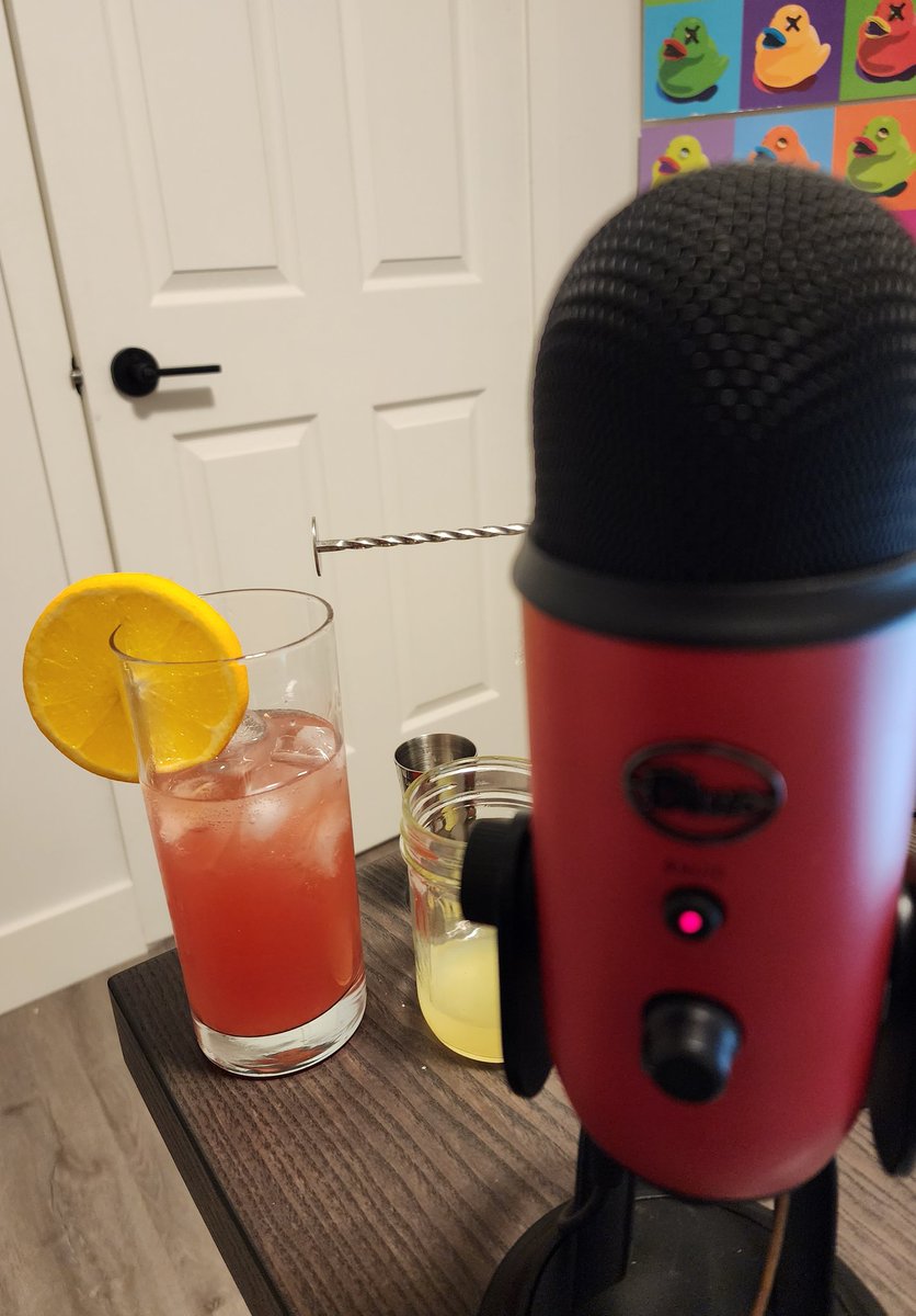 The "Surrey Special" cocktail The Bicycle Thief
1 Oz - Compari
1 Oz - Gin
1/2 Oz - Lemon Juice
1 1/2 Oz - Grapefruit Juice
1/2 Oz - Simple Syrup
Top w/ Soda Water and Stir
Orange Pinwheel Garnish