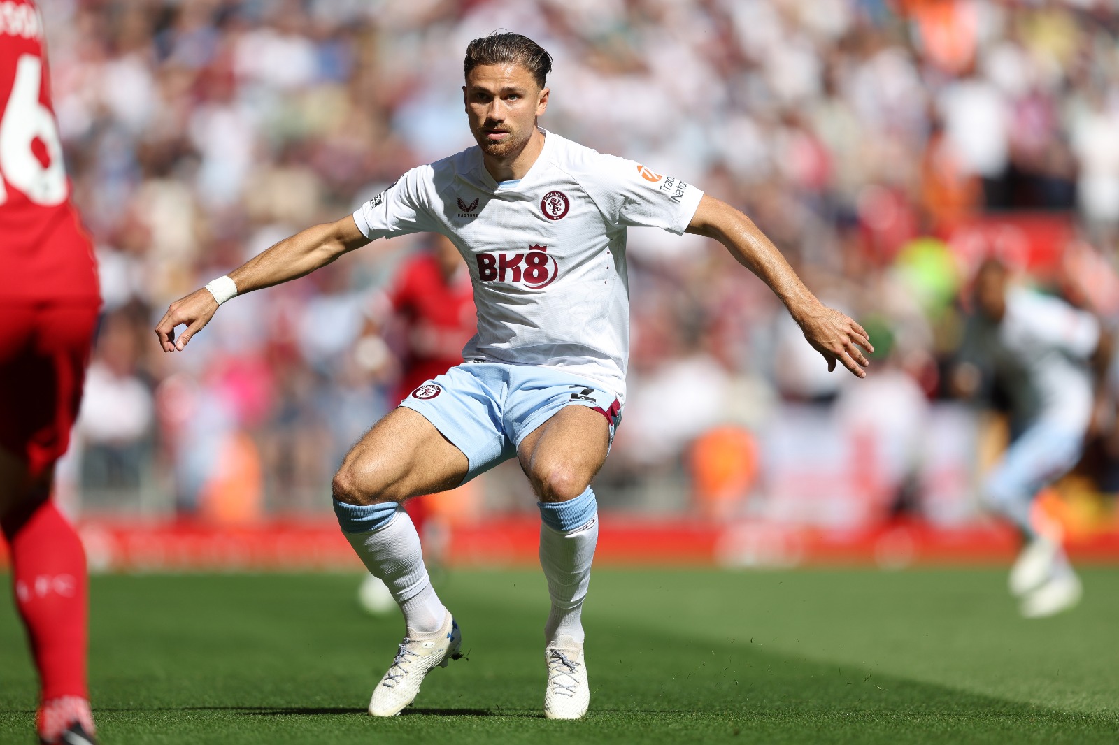 Matty Cash in action against Liverpool.