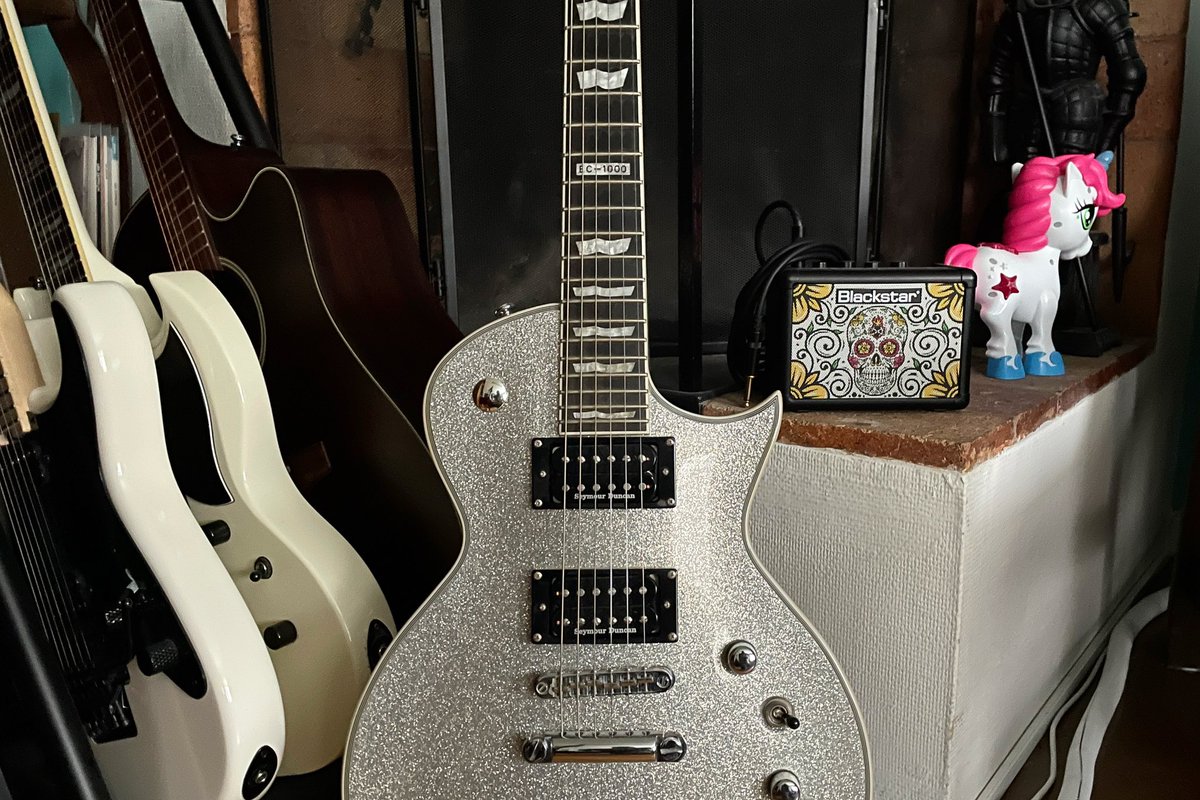 My corner with my work-axe arsenal, a #BlackstarFly3 mini amp and a fkin #unicorn. #espguitars #ltdguitars #ltdviper #ec1000 #ltdec1000 #ltdeclipse #silversparkling #charvelguitars #charvelpromod #charvelsocal #seymourduncan #takamine #takaminep1dc #guitars