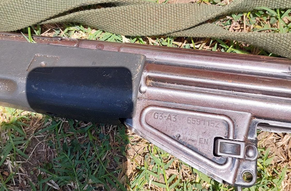 DCI_Kenya's tweet photo. DETECTIVES RECOVER 2 LOST POLICE FIREARMS 

Two police firearms that had been stolen from a GSU camp in Kopsiro, Bungoma County, on August 23, have been been recovered and the main suspect arrested. 

The G3 rifles one of which was loaded with 20 rounds of 7.62mm caliber disappeared mysteriously from Korngotuny GSU camp, prompting an operation led by sleuths from the elite Crime Research & Intelligence Bureau to recover them.

After conducting comprehensive investigations and analysis, the detectives identified the main suspect behind the disappearance, one Isaac Wanzala, a former GSU officer currently suspended from the service on disciplinary grounds. 

The suspect who hails from Mabonge Village in Nambale, Busia County, is believed to have sneaked into Korngotuny GSU camp on the night the firearms disappeared and left with them undetected. 

A raid was conducted at the suspect’s home today at dawn, prompting the thug to sneak into a nearby sugarcane plantation to evade arrest. 

But the officers who were determined to arrest him mounted a spirited search that lasted for hours in the vast field of sugarcane and finally smoked him out.

The thug who appeared not to have forgotten his concealment lessons at the paramilitary unit, had utilized the available thick cover of the cane in an attempt to deceive our men, but gave up when the detectives deployed plan B of their operation. 

After being apprehended, he led the officers to the banks of River Sio, that snakes close to his father’s land where the firearms were recovered buried on the ground.

The suspect is currently in custody pending arraignment in court. 
#FichuakwaDCI  0800 722 203.