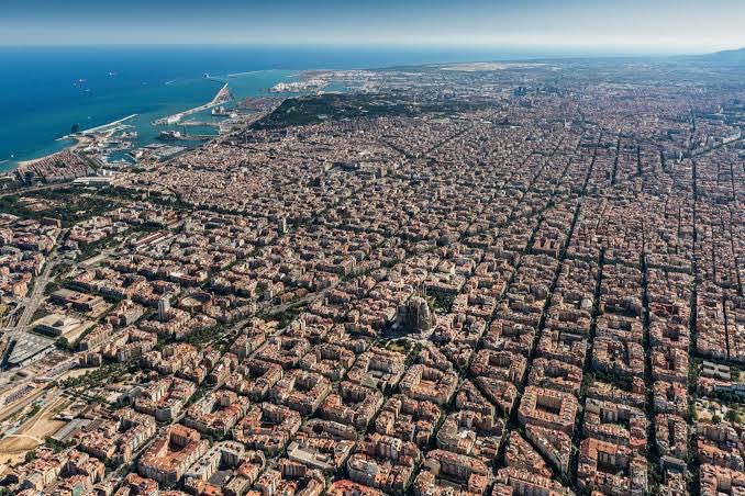 “Why are cities in the US so spread out?”

Atlanta vs. Barcelona: