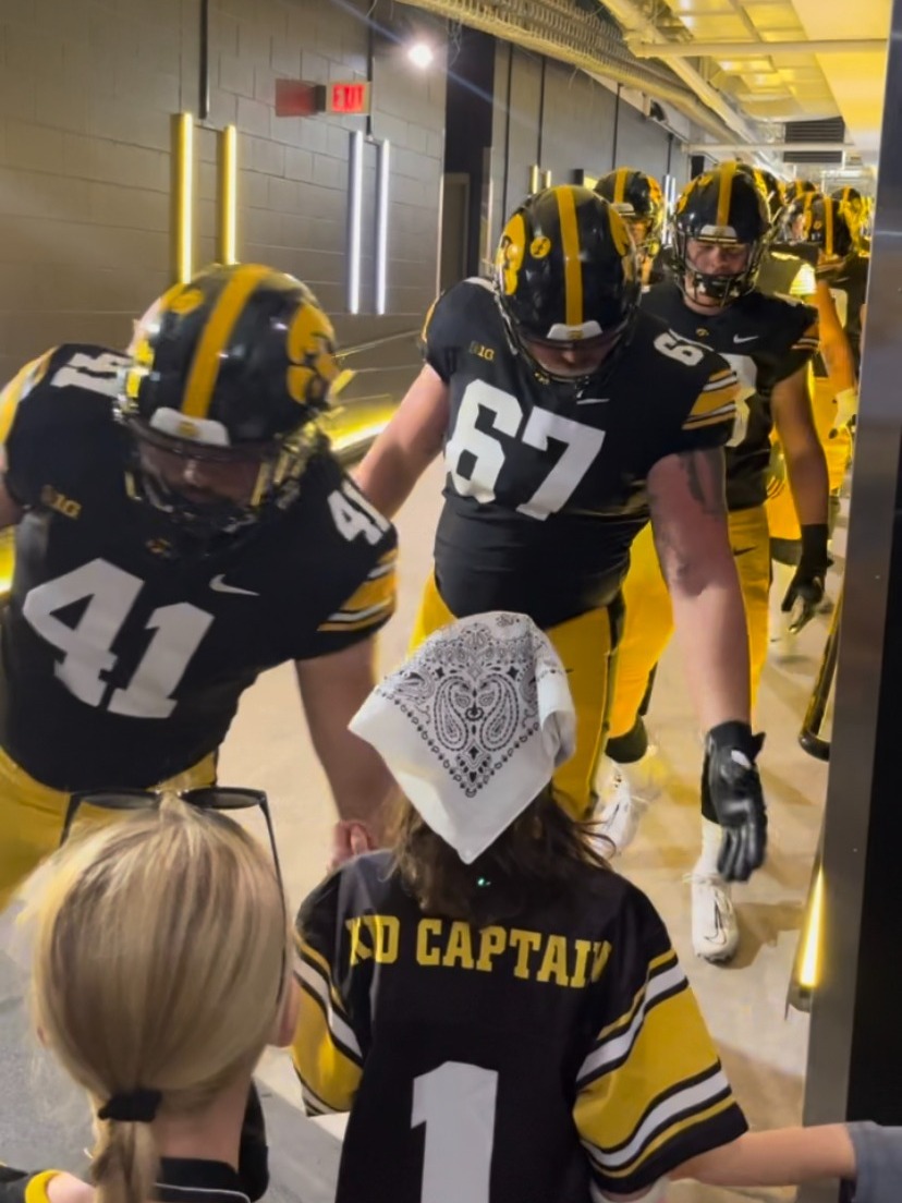 UIchildrens's tweet photo. Her rare cancer in remission, #KidCaptain Gracelyn Springer had a day to remember Saturday at the season-opener for @hawkeyefootball. 💛🖤 https://t.co/dw0iEjNUq8
