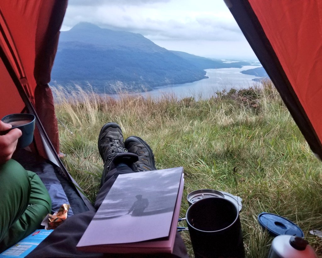 NiallM79's tweet photo. Last nights wild camp overlooking Loch Lomond and enjoying the read through @RoddyWoomble latest journal. #almostnothing https://t.co/YREh1wffjt