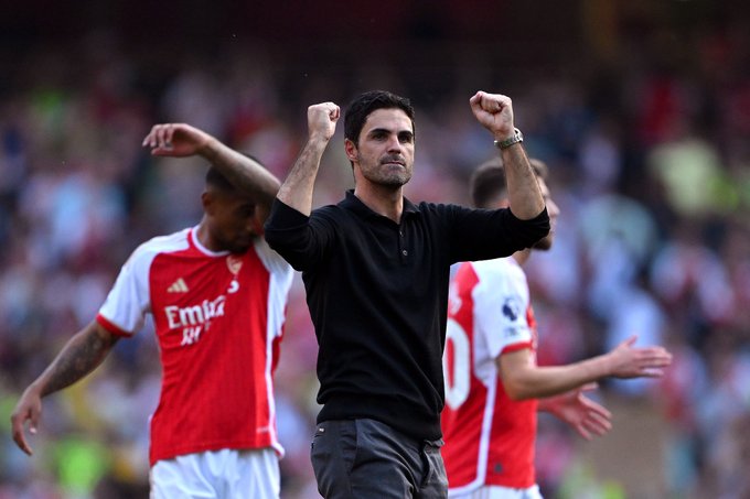 Mikel Arteta celebrates following tonight's dramatic 3-1 victory over Manchester United.