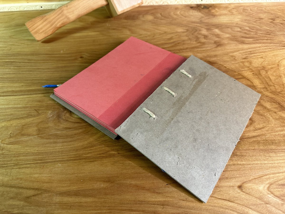 1o57's tweet photo. Get out of here with your glued spine cheap book binding- cord sewn bind in process #handBookbinding https://t.co/h3pqWORL8m
