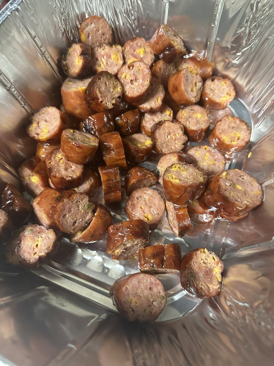 Been a good day of smoking foods! Pork shoulder is wrapped and finishing off and queso is on. All the sausages are done and sliced. Can’t wait to eat!