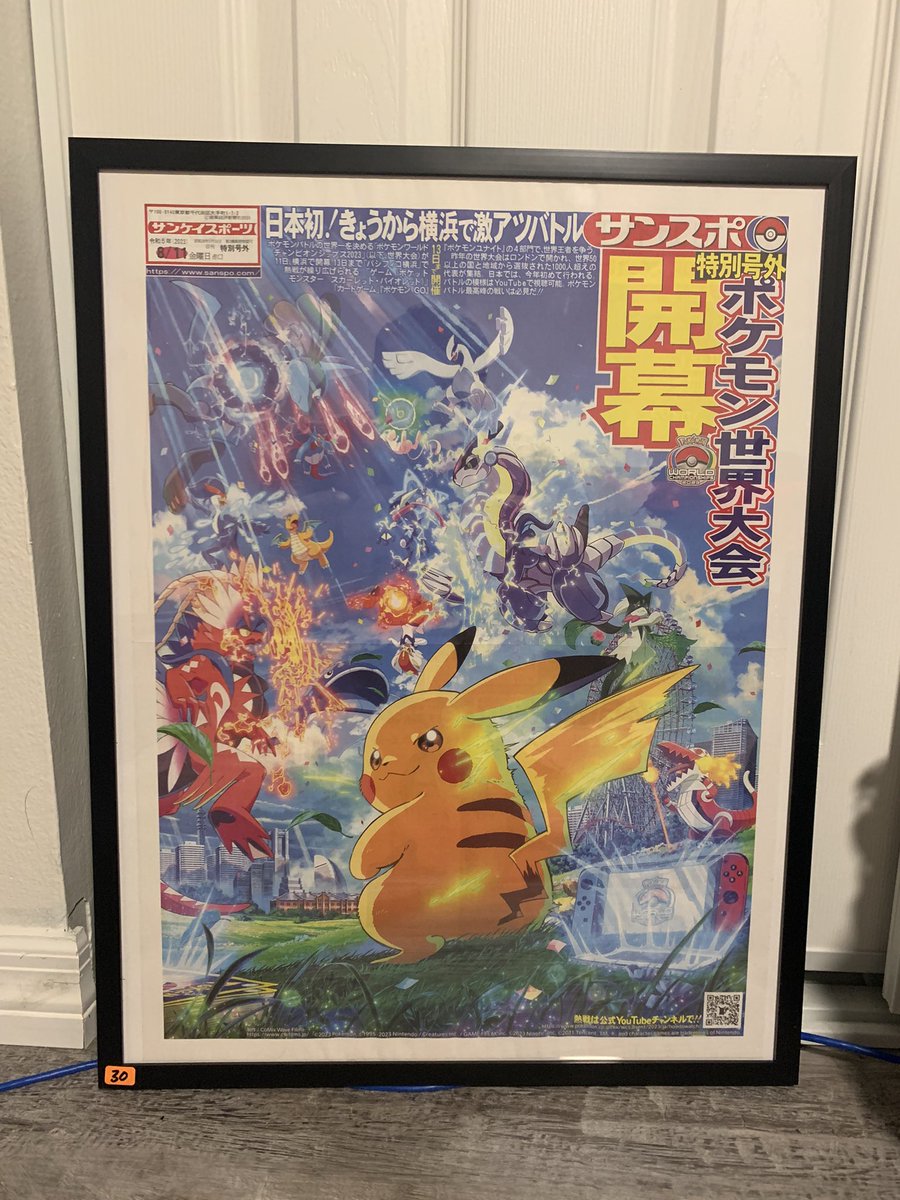 KingTurkYT's tweet photo. I’ve never hung up anything before, but I just picked this up, and I think it’s time. The 2023 Yokohama World Championship newspaper is AMAZING. This is ART. https://t.co/C5oq8eYtMu