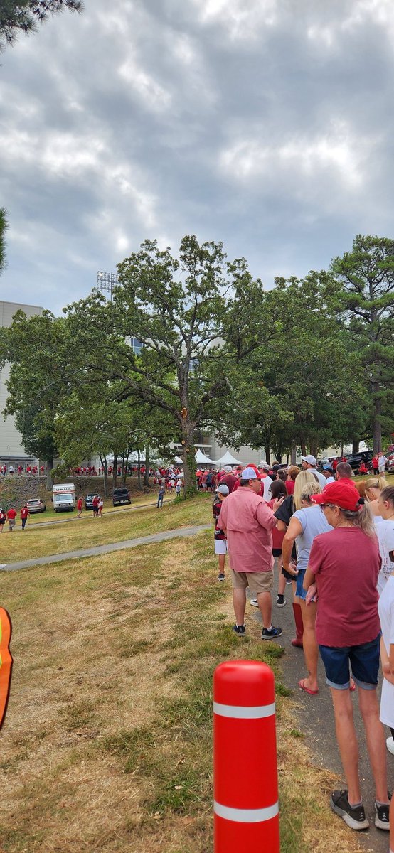 Keyf07's tweet photo. @NWAHutch Here's the midpoint of the line to "check and not scan" tickets.  Arrived 1 hour early.

If SEC goes to 9 games in 2025 let's hope WMS is axed.  Reschedule ASU in Fayetteville. https://t.co/uEbOnwQOsc