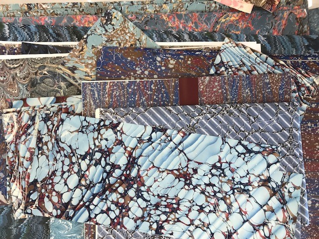 wyorksarchives's tweet photo. It's #MarbledMonday & here in #Conservation we keep a selection of decorative hand-marbled & machine assisted papers which we can use for repairs, endpapers and for lining bespoke boxes. Here is our fabulous array of #MarbledPapers from our blue collection!
#ArchiveConservation https://t.co/P5kOvnk4QM