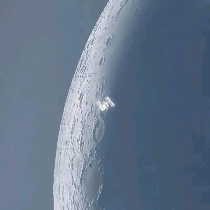 Photographer captured the International Space Station passing in front of the moon with precision timing. It only takes about 0.5 seconds for the entire pass. Credit: Andrew McCarthy