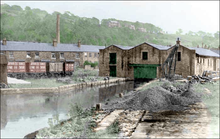 Whaley Bridge Canal Basin and Transhipment Warehouse. One of the few photographs showing the railway sidings in use. Digitally colourised from a black and white original. #Derbyshire #WhaleyBridge
