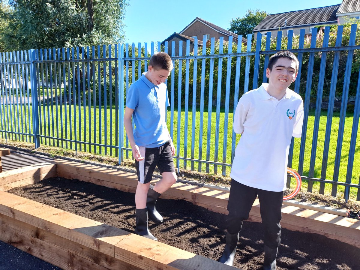 Working together, learning building site skills to fill our new planters at the Glenburn ASN Vocational Campus @ Carnboe