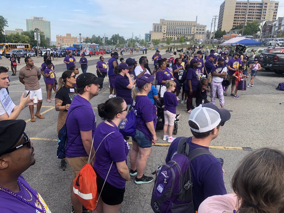 “More Scrubs, Less Suits!” <a href="/MayorEdGainey/">Mayor Ed Gainey</a> wears our shirt at #Pittsburgh #LaborDay in solidarity with nurses &amp; healthcare workers!