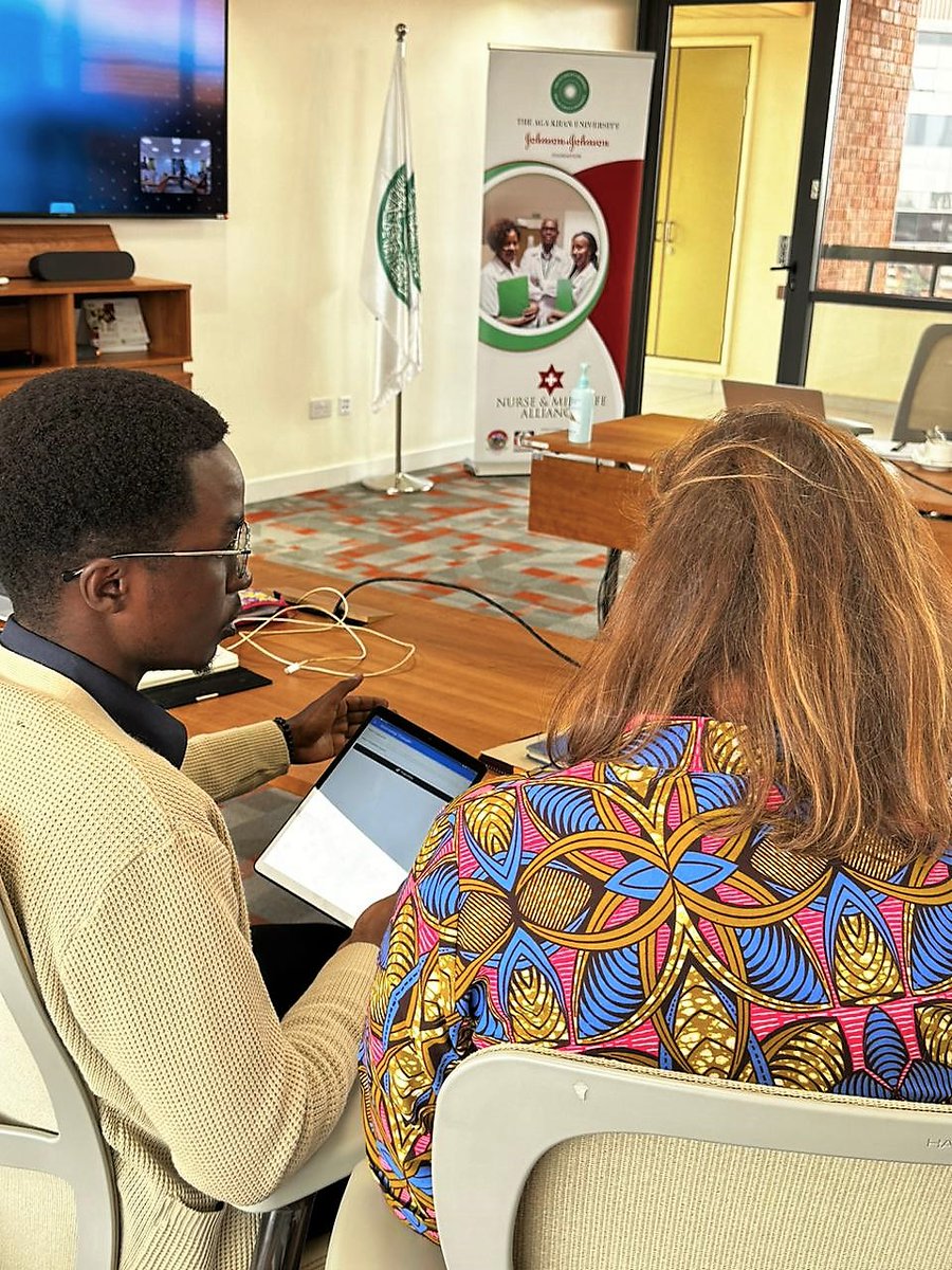 A software programmer from @mHealth_Kenya demonstrates the various capabilities of the #KeNum app to Stacey Meyers, the Global Community Impact Leader-EMEA @JNJGlobalHealth.