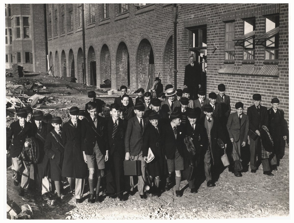 Pupils @KESBham on the first day of term, 1940. On top of that it was also the first day in the newly built school at Edgbaston, and for some the first day back onsite after being evacuated to Derbyshire due to the onset of #WW2. #EYAEducation #BacktoSchool2023