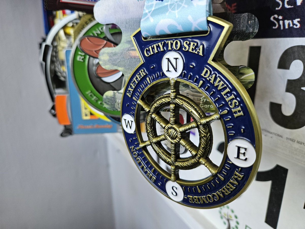 ClivePoole's tweet photo. Medal Monday is all the sweeter when you know you've truly earned the bugger!😂😂🏅 Post marathon #64 rehydration still on-going! 🧔👱♀️🐕❤️ @UKRunChat @runr_uk #ukrunchat #windingpaths #citytothesea #medalmonday #runr https://t.co/dP8begqEDd