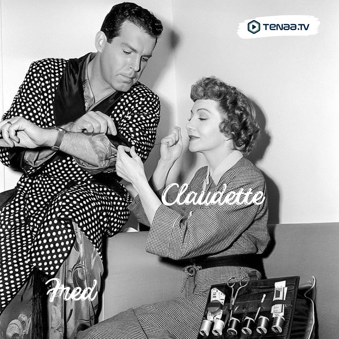 TenaaTV's tweet photo. American actor Fred MacMurray sits on the armrest of a sofa while French-born actor Claudette Colbert sews the cuff of his polka dot robe during the Hollywood Victory Caravan. #VIVANT #SalaarOnSep28th #EN_WORLDTOUR_FATE #IndvsNep #Chandramukhi2 #NinaAgdal #MeghanMarkle #Abhiya https://t.co/fqauzwUrMe