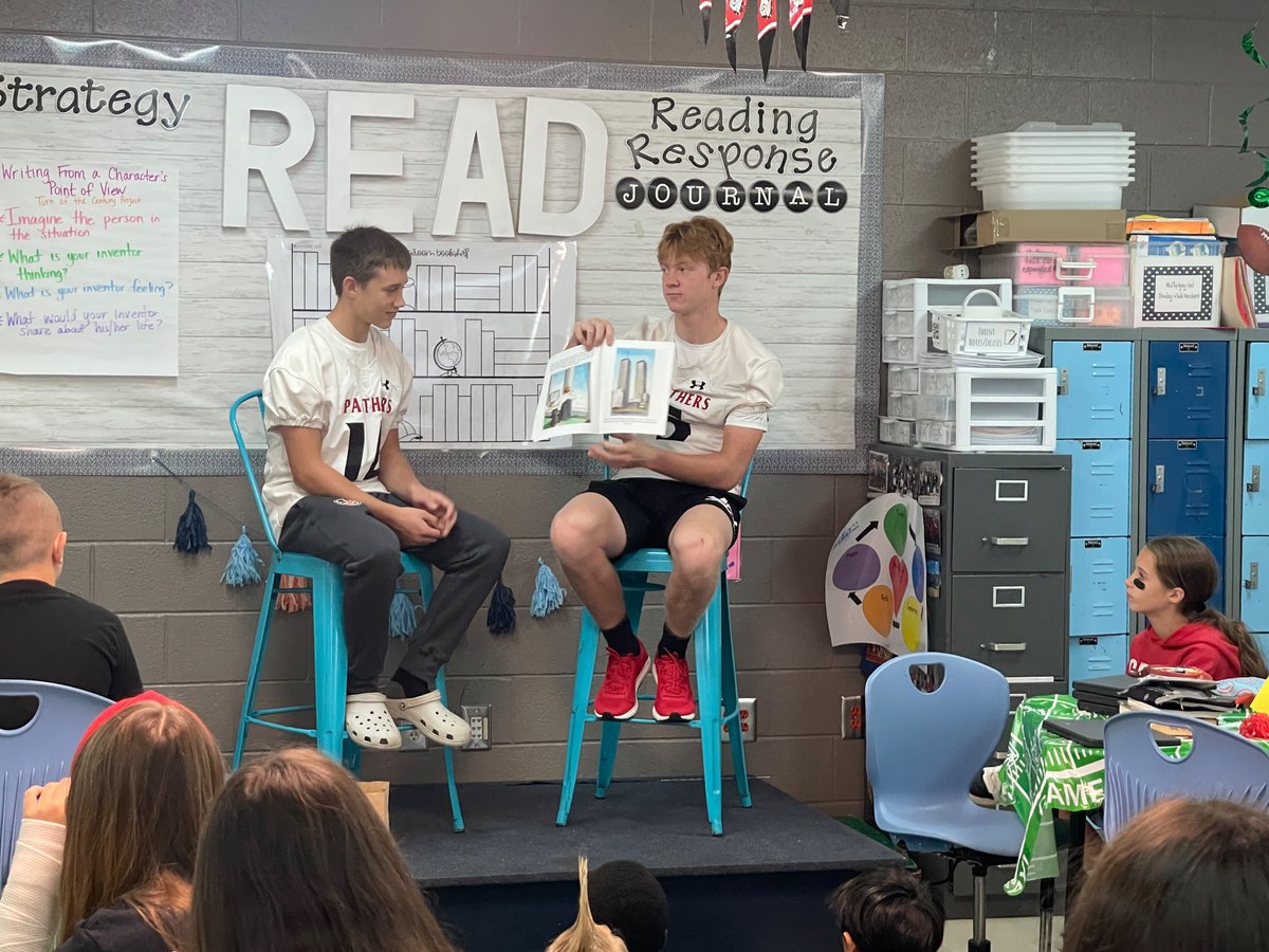 WJESClarke5th's tweet photo. My teacher heart was happy to have these two football players and former students join us today.  They were part of my “2020 shut down” class, and they read a 9/11 book and tried to help us with a football brain teaser.  @JCPantherAth  #successatjcss https://t.co/ggleMGNIJz