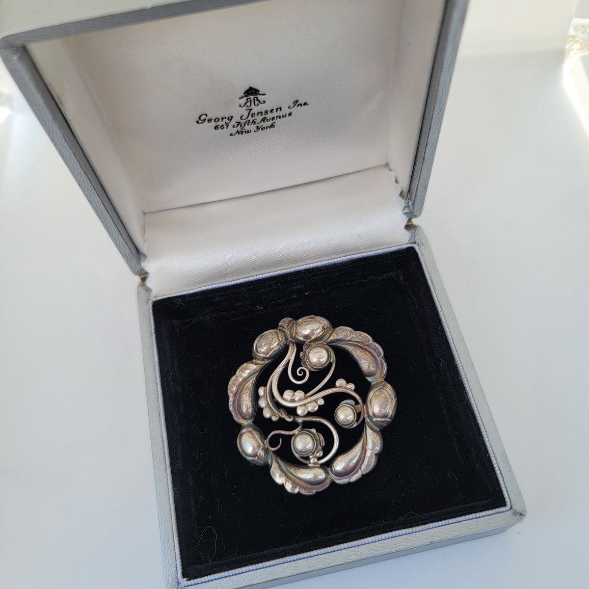 cleverbaubles's tweet photo. Georg Jensen of Copenhagen created Art Nouveau style hollowware, watches, jewelry, and even home products since 1904. This rare, vintage, sterling silver "Moonlight Blossom" brooch is only one example (listed for sale on my Poshmark site). https://t.co/uzm97LPikP