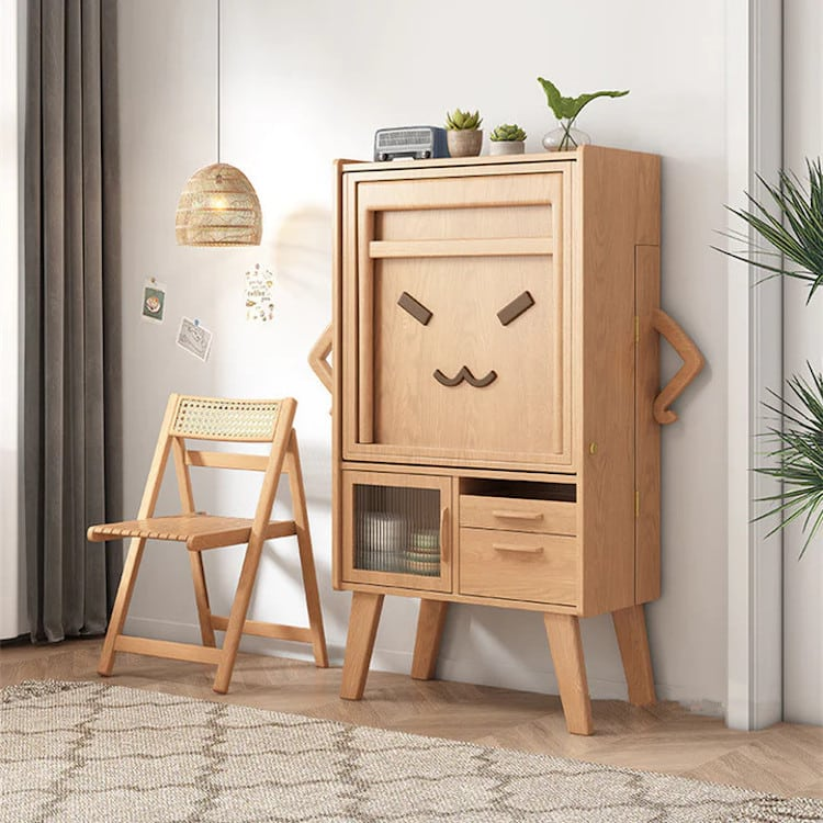 kotecinho's tweet photo. Cartoon-Faced, Space-Saving Sideboard https://t.co/60YINYUACn