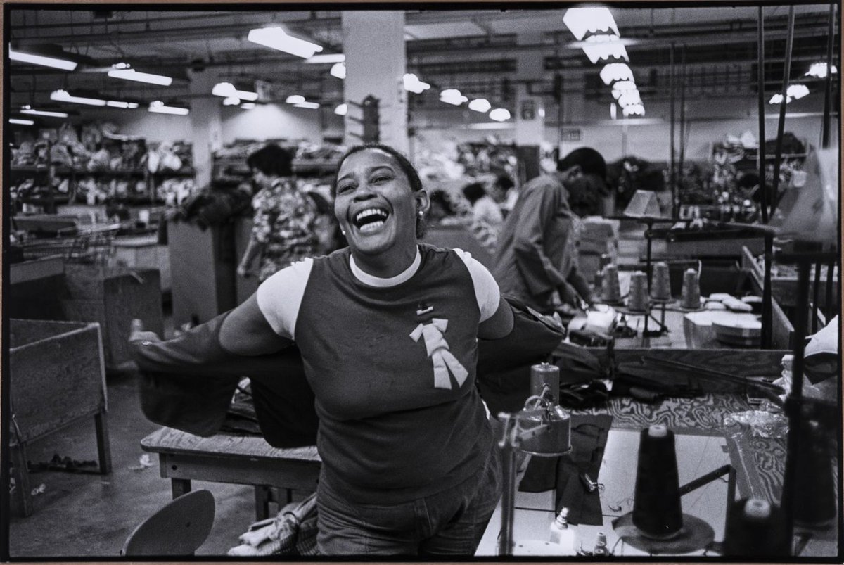 The Studio Museum in Harlem wishes you a splendid Labor Day!

In "Mom at Work," photographer Carrie Mae Weems captures her mother, Carrie Polke, in a moment of laughter while at her factory job. On this day, we hope you can rest, relax, and feel proud of your achievements.