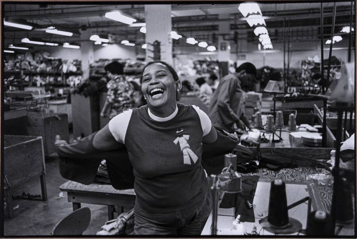 The Studio Museum in Harlem wishes you a splendid Labor Day! In 'Mom at Work,' photographer Carrie Mae Weems captures her mother, Carrie Polke, in a moment of laughter while at her factory job. On this day, we hope you can rest, relax, and feel proud of your achievements.