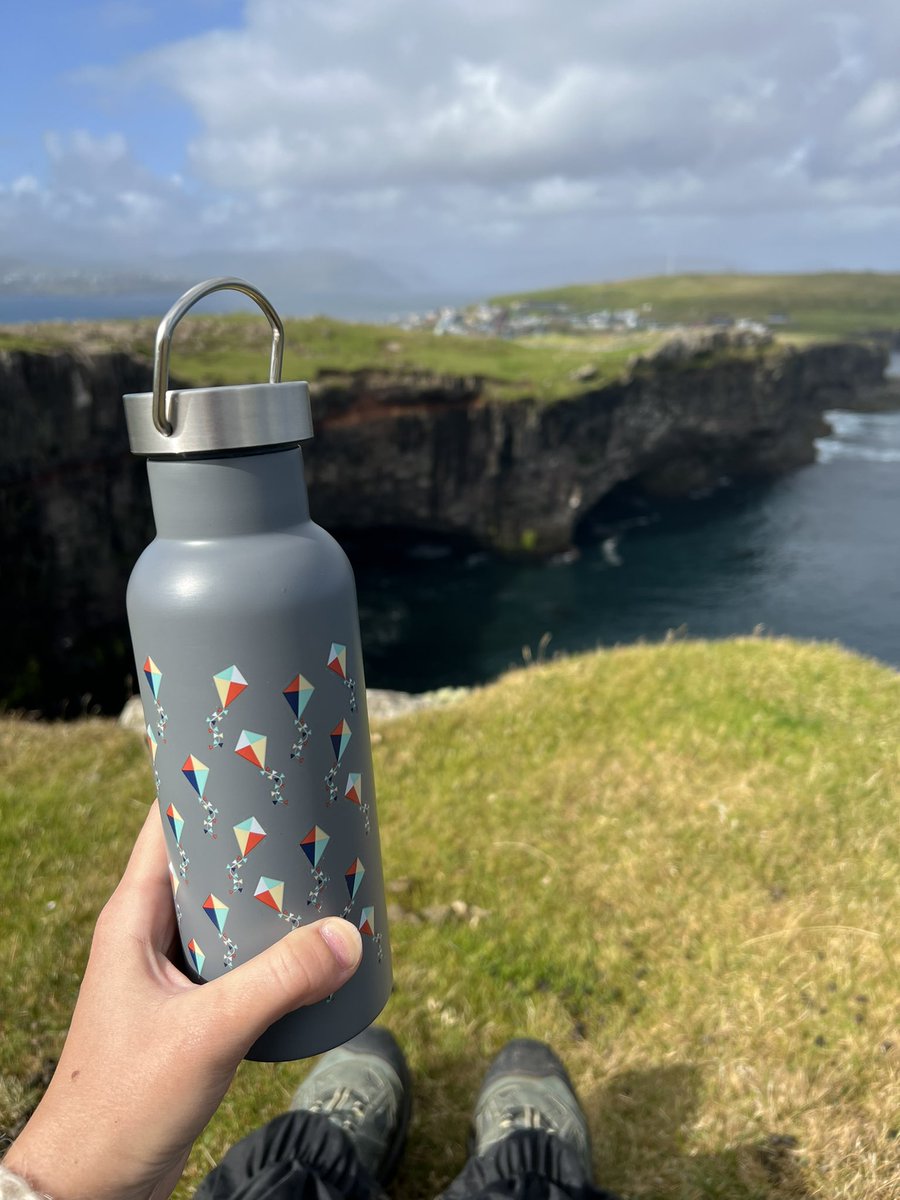 annaznoj's tweet photo. Great day on the #FaroeIslands. Tea just taste different when you are having a break near the cliff 🫖 Even #grass is more green here! 😉 https://t.co/i29hads6LX
