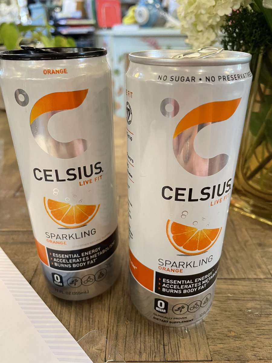 StockmanLaura's tweet photo. Hey @CelsiusOfficial - what is going on with the two different tops on my Sparkling orange?? One has carbs and one doesn’t??? I need answers!! Is there an imposter here! Should I be concerned?? https://t.co/HGvjO37cAA