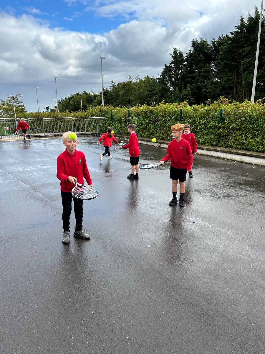 SchoolHillside1's tweet photo. I think #P6B preferred last week’s rain to this week’s sunshine while practising our tennis skills ☀️ 🎾 https://t.co/gkjOX0stMf