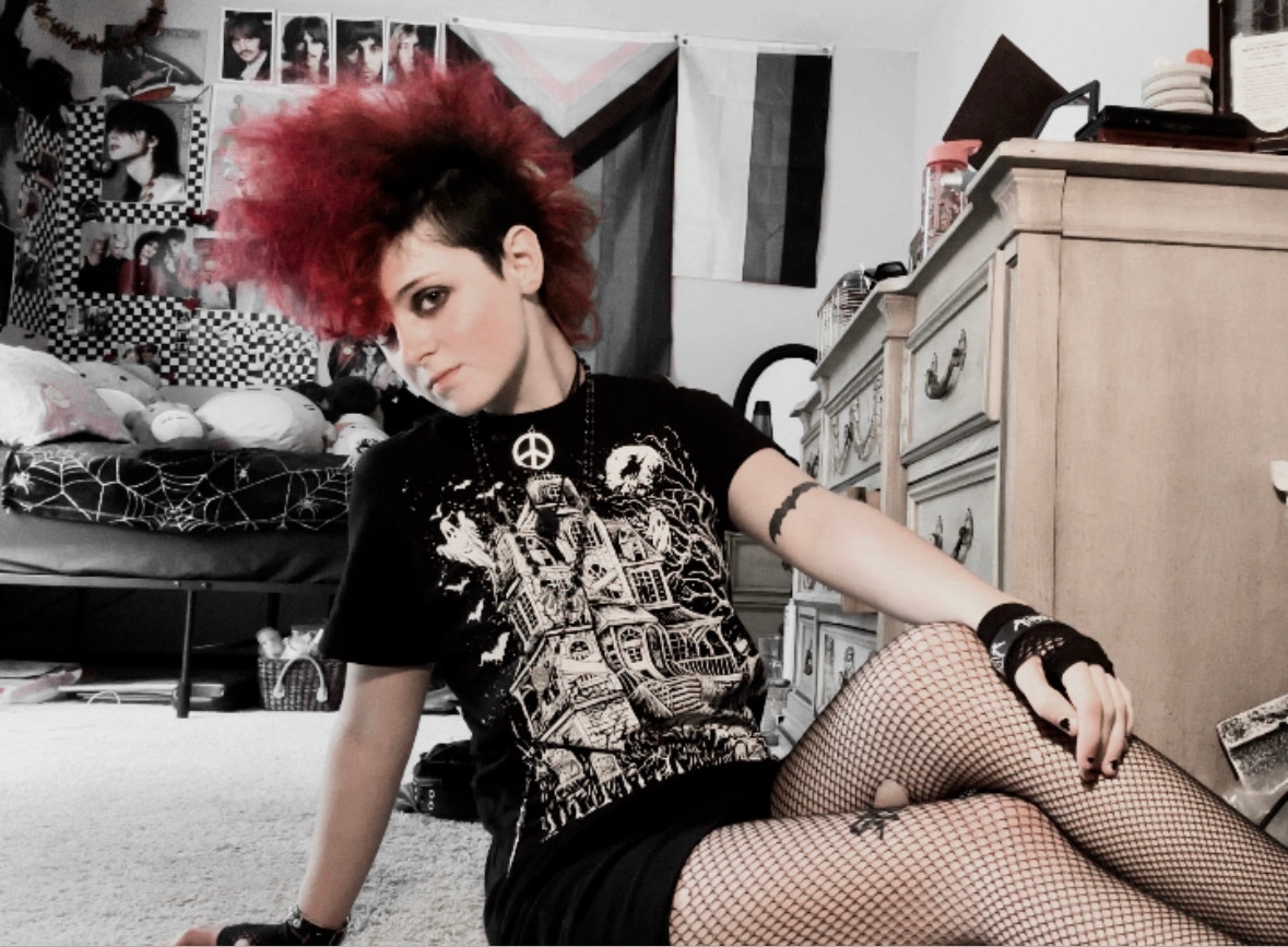 VampireFreaks's tweet photo. The fangtastic @1980svegan rocking our Haunted Mansion Tee! #HauntedMansion #VampireFreaks #Goth #Deathrock #SpookyFashion #SpookyTee https://t.co/zKnlNawQFy