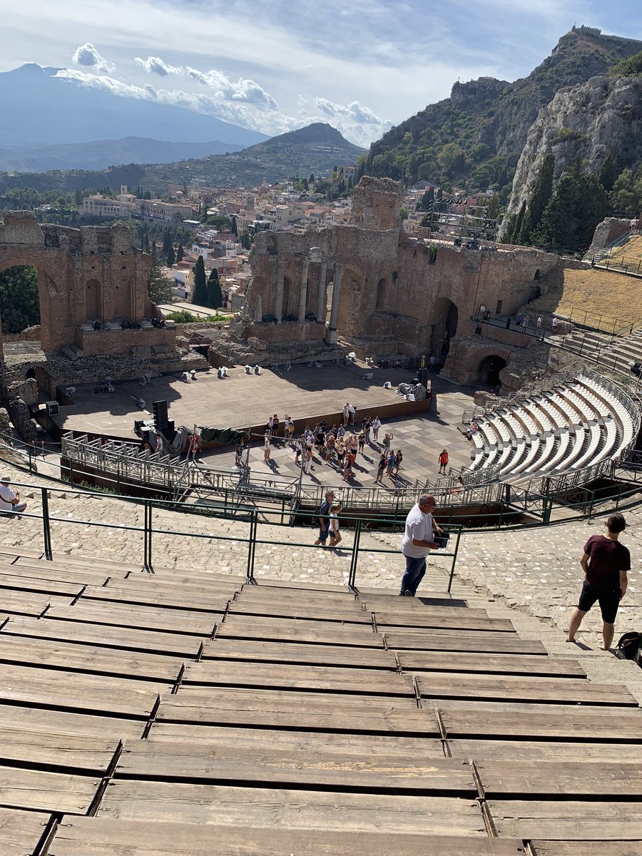 Yazzer07's tweet photo. Went to Taormina today. Visited the ancient theatre. Mt Etna in the background #veryhot https://t.co/4WOEM7zunB